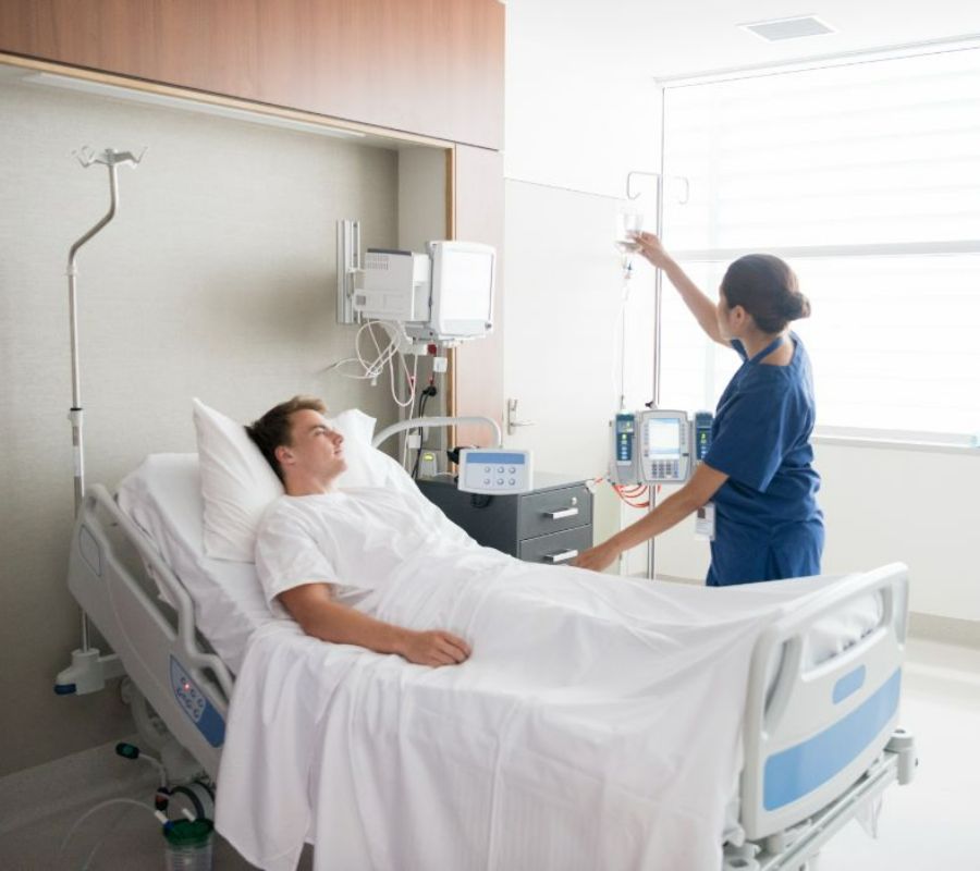 ward nurse tending to patient